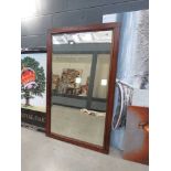 Rectangular bevelled mirror in stained beech frame