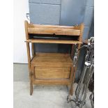 Oak book trough with slide, shelf and cupboard under