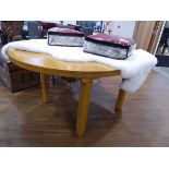 Modern light oak circular extending dining table