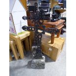 Pair of 19th century continental wrought iron grave markers in crucifix form mounted within stone