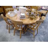 Modern pine extending dining table with 6 matching beech dining chairs (2+4)