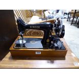 Cased Singer hand operated sewing machine EJ932426