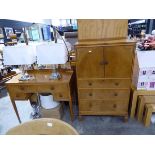 Early 20th Century pale oak bedroom suite comprising 3 drawer cupboard and matching dressing unit