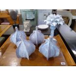 +VAT 4 aged white ceramic Carambola seed ornaments and 1 blue and white palm tree candlestick