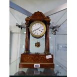 Inlaid mahogany mantle clock with sun shaped pendulum and key