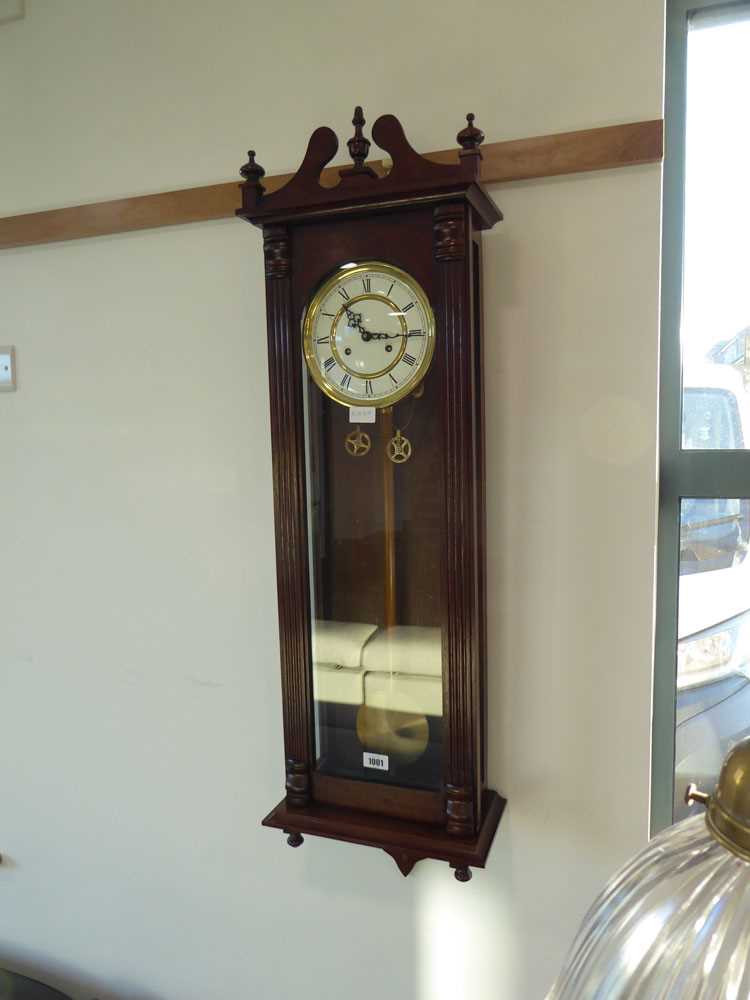 Mahogany cased wall clock with 2 weights, pendulum and key