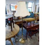 Brass standard lamp with cream shade