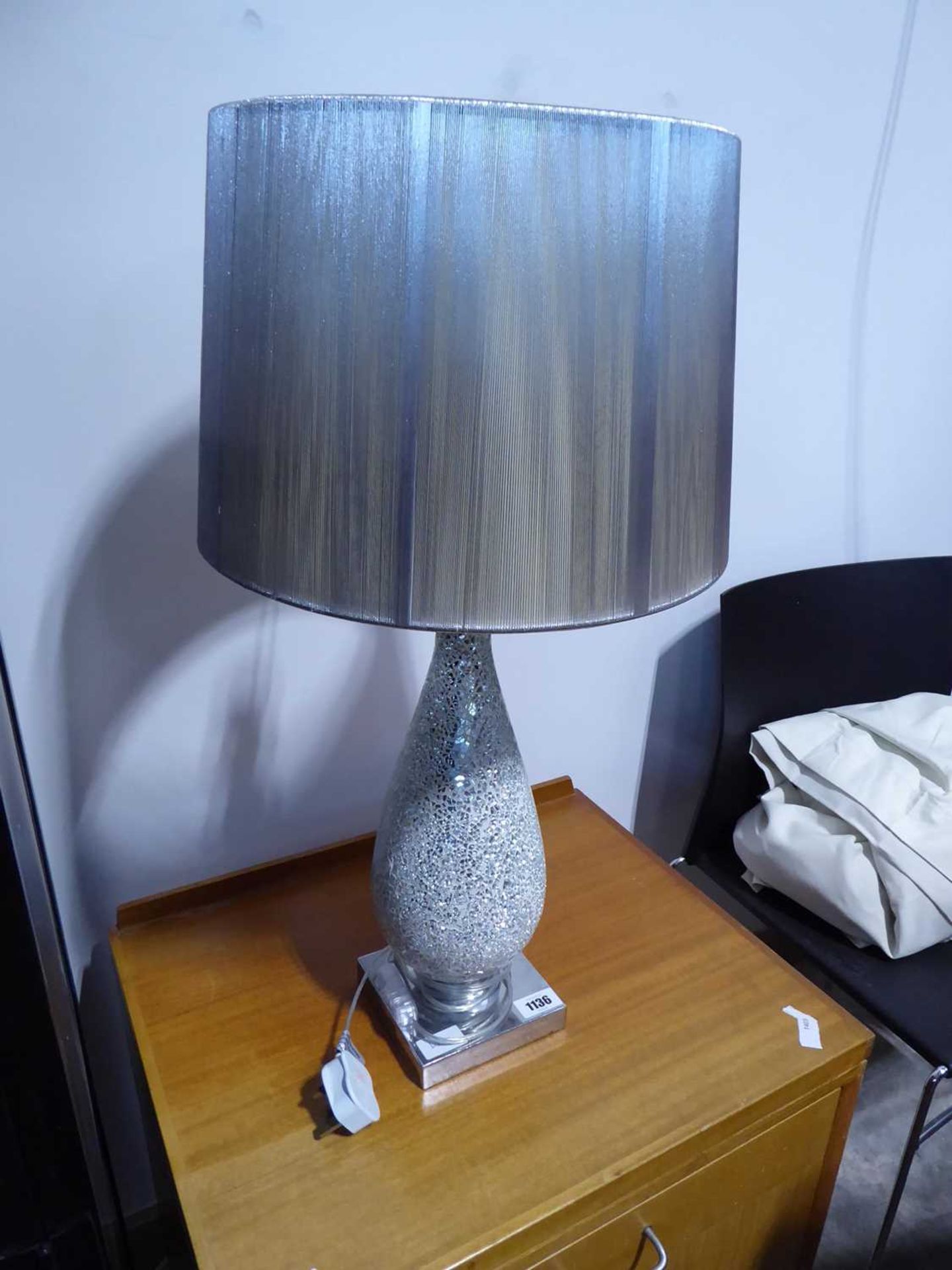 Sparkling table lantern with silver coloured shade