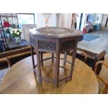 Heavily carved campaign table with brass inlay