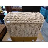 Wicker laundry basket in the form of a chest