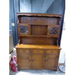 Dark oak dresser in the Old Charm manner