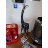 +VAT Floor standing silver coloured giraffe ornament