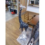 +VAT Floor standing silver coloured giraffe ornament