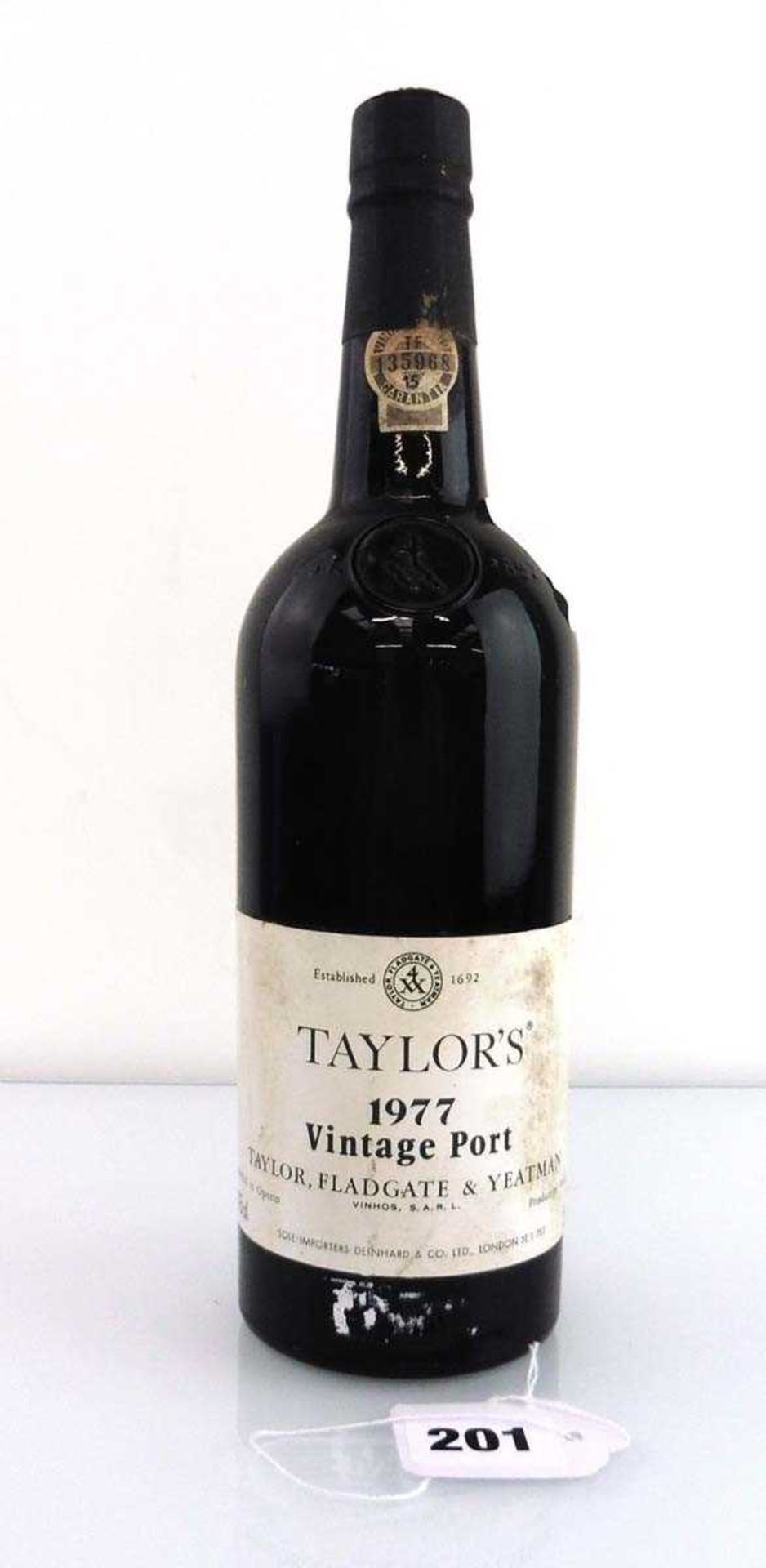 A bottle of Taylor Fladgate & Yeatman 1977 Vintage Port (ullage top shoulder)