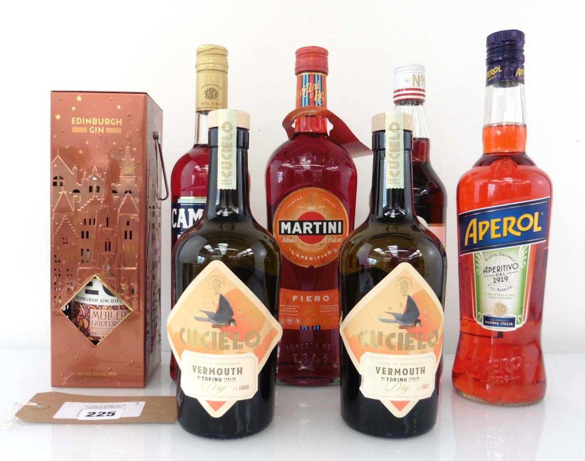 +VAT 7 bottles, 1x Edinburgh Mulled Gin Liqueur with tin 50cl 20%, 1x Campari Bitter 70cl 25%, 2x