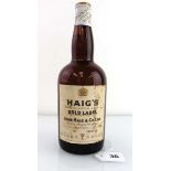 An old bottle of Haig's Gold Label Scotch Whisky circa 1950's with Spring cap 70 proof (no size