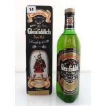A bottle of Glenfiddich Pure Malt Scotch Whisky circa 1980's in Clan Maclean tin 43% 75cl