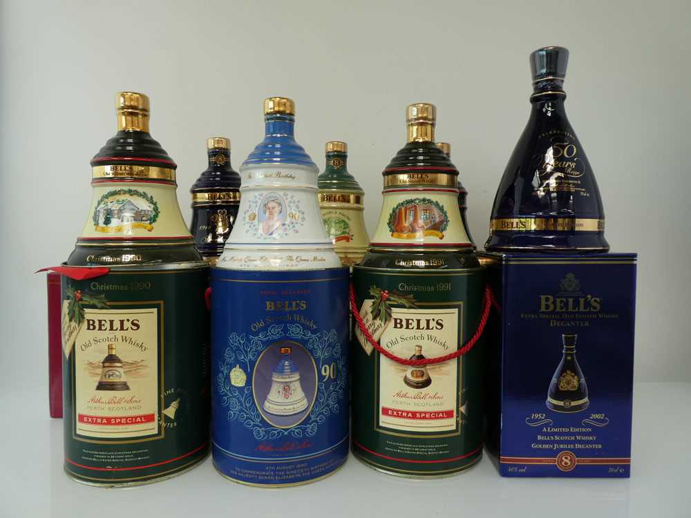A Collection of 9 Bell's Celebration Decanters in boxes/cartons, Christmas 1990, 1991, 1994, 1998,