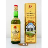 A bottle of The Glenlivet 12 year old Pure Single Malt Scotch Whisky circa 1980's Duty Free label