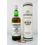 A bottle of Laphroaig 10 Year Old Pre Royal Warrant Single Islay Malt Scotch Whisky with carton