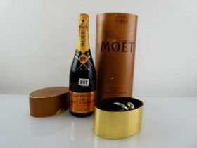 A bottle of Moet & Chandon Brut Imperial Rose with box & Special Edition Bottlestop designed by