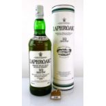 A bottle of Laphroaig 10 year old Islay Single Malt Scotch Whisky old style circa 1990s with