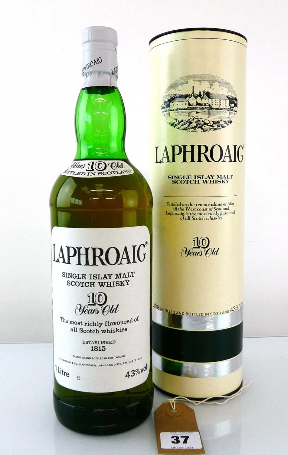 A bottle of Laphroaig 10 year old Islay Single Malt Scotch Whisky Pre Royal Warrant with carton 1