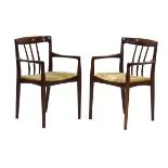 A pair of 1960/70's Danish mahogany elbow chairs by Bramin, labels to the underside*Sold subject
