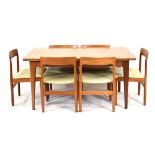 A 1960's teak dining suite by A. Younger Ltd. including a drawer-leaf table, 147-243 cm x 85 cm,