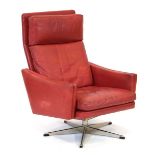 A 1960's Danish high-back armchair upholstered in red leather on a five-star swivel base*Sold