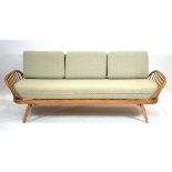 Lucien Ercolini for Ercol, an elm and beech sofa/daybed, with 'surfboard' back and curved spindled