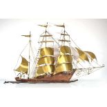 Daniel d'Haeseleer: a copper and brass wall light sculpture modelled as a three-master sailing ship,