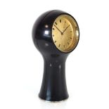 Angelo Mangiarotti for Secticon, a Swiss T1 table clock with a brass face and black case, h. 25 cm