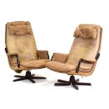 A pair of 1970's Danish reclining high-back armchairs by Berg Furniture, the buffalo leather seats