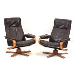 A pair of Norwegian bentwood and upholstered adjustable armchairs on five-star bentwood bases*Sold