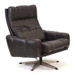A 1970's Danish brown button-upholstered armchair on an aluminium five-star swivel base*Sold subject