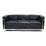 After Le Corbusier, an LC3-style three-seater sofa upholstered in black with a chromed frame*Sold