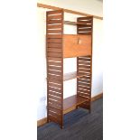 Robert Heal for Staples, a teak modular 'Ladderax' shelving system including two wooden uprights, h.