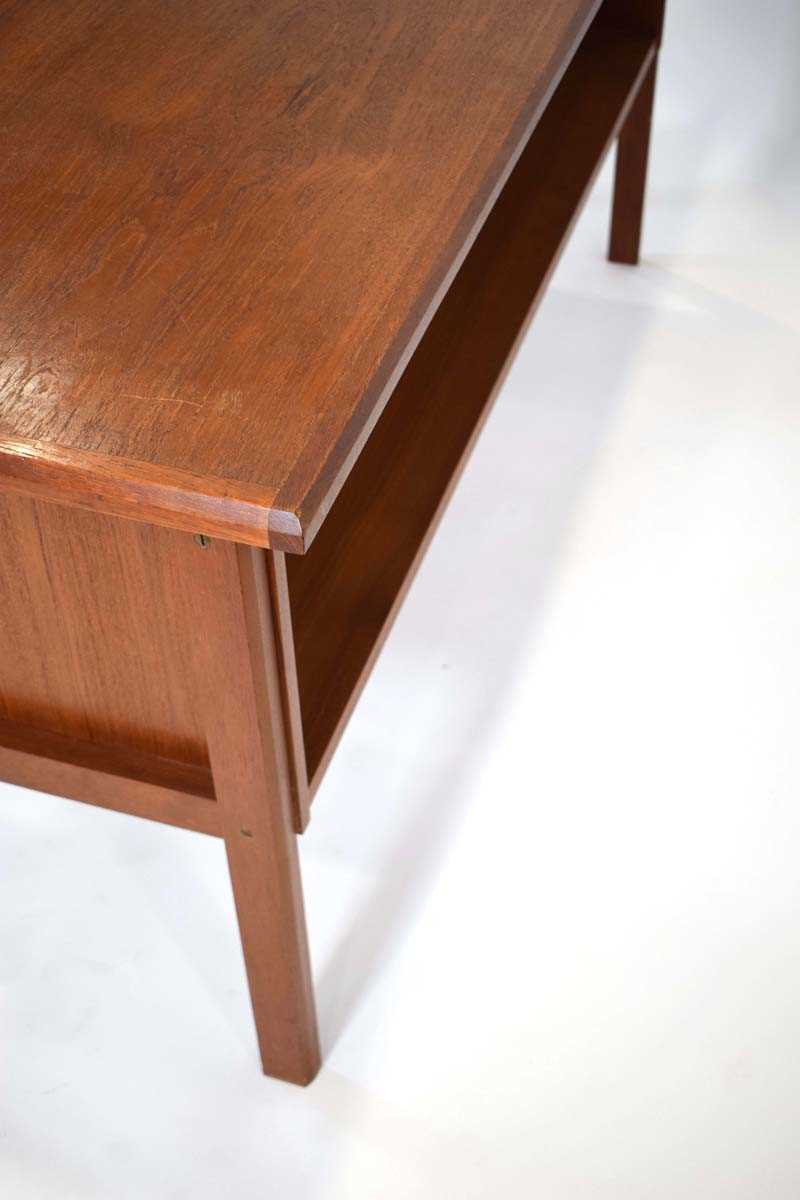 A 1960's Danish teak and crossbanded kneehole desk with an arrangement of seven drawers, the reverse - Image 5 of 5