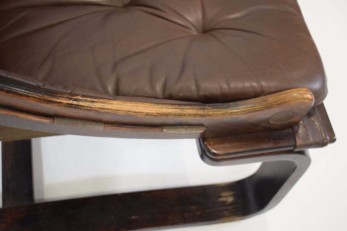A 1970's Norwegian lounge chair, the brown leather button-upholstered seat on a bentwood frame* - Image 4 of 5
