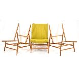 Lucian Ercolani for Ercol, a set of three 1960's '427' television chairs in beech, with one set of