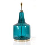A large aquamarine glass lamp base with a stainless steel shaft, h. 60 cmNo obvious chips or cracks.