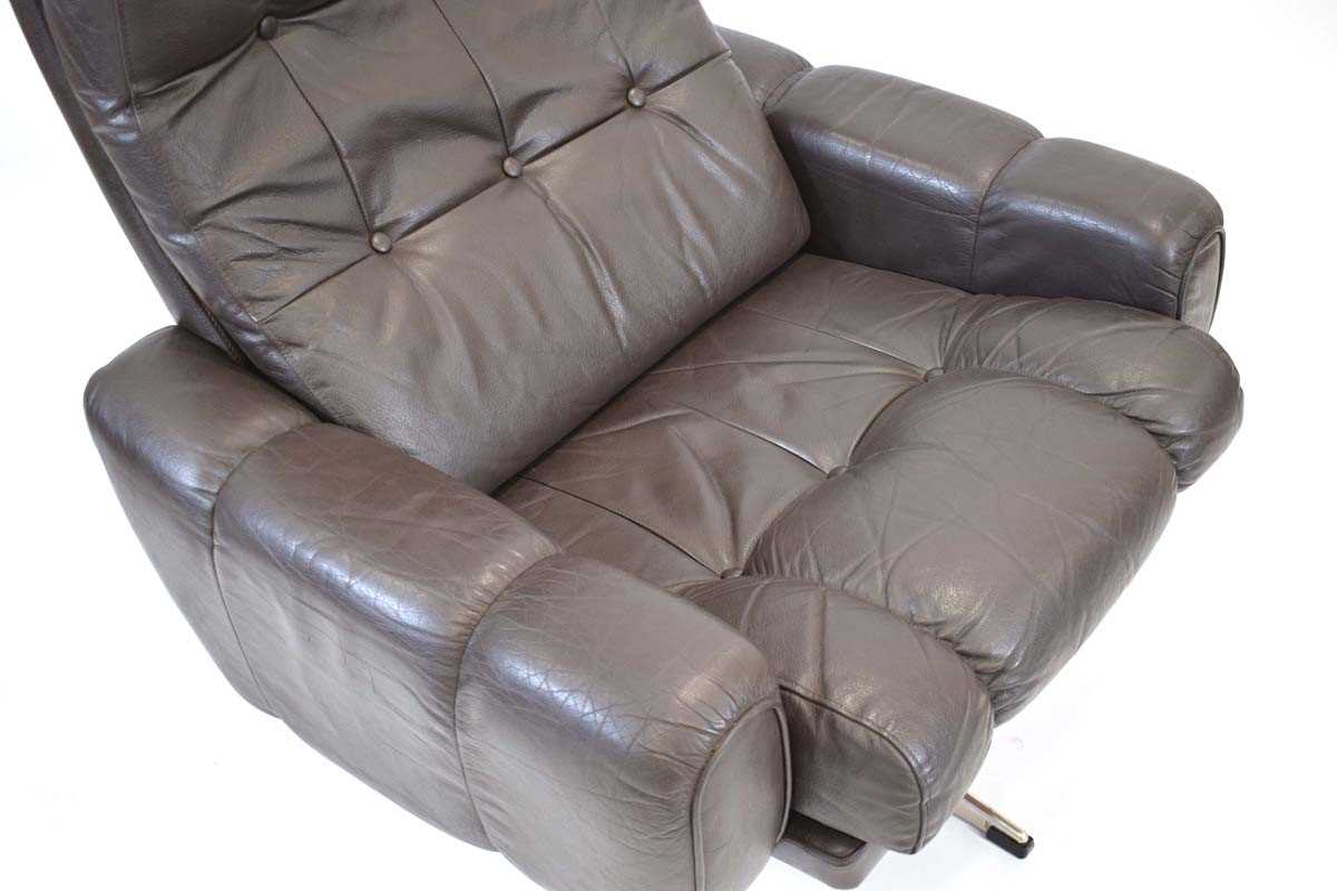 A 1970's Danish brown button-upholstered armchair on an aluminium five-star swivel base*Sold subject - Image 2 of 2
