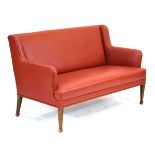 A 1940/50's Danish sofa or loveseat designed by Frits Henningsen (1889-1965), later upholstered in