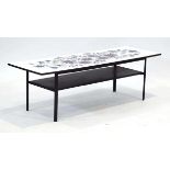 John Piper for Terence Conran, a 1960's formica coffee table with a floral ground, 115 x 38 cmThe
