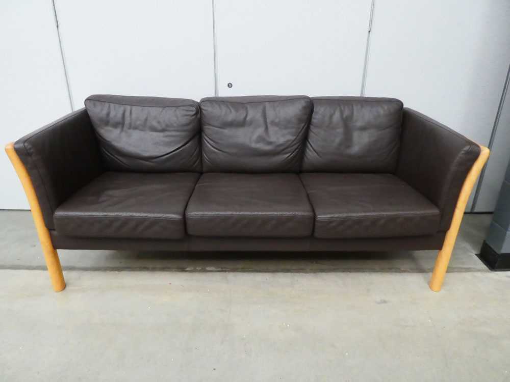 A Danish beech framed three-seater sofa with brown leather upholstery*Sold subject to our Soft