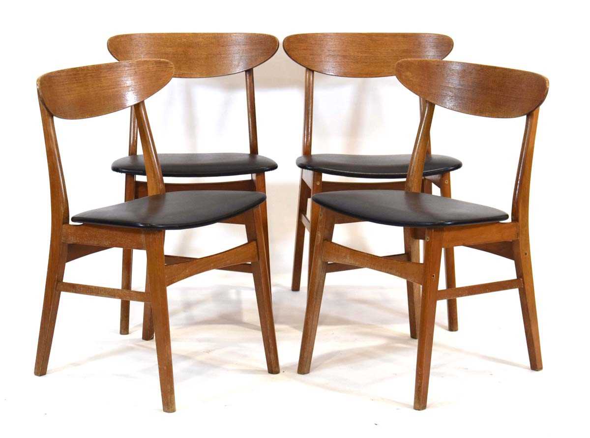 A set of four 1960's Danish dining chairs by Farstrup, the oak bentwood back rests over black