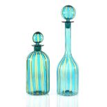 A pair of 1950's Italian bottles and stoppers by Murano, the blue bodies with yellow 'cane'-type