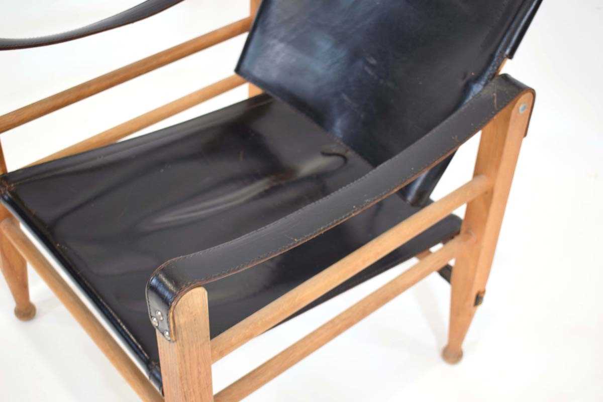 Aage Bruun & Son, a 1960's oak framed 'Safari' chair upholstered in patinated black leather *Sold - Image 5 of 11