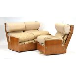 A 1960's ply two-seater sofa and matching armchair, retailed by Harrods 'Way In' section *Sold